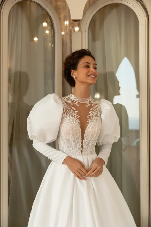 Open back wedding dress with long sleeves