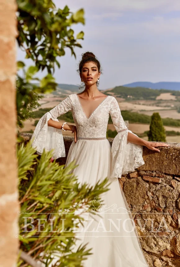 Boho wedding dress with long flared sleeves