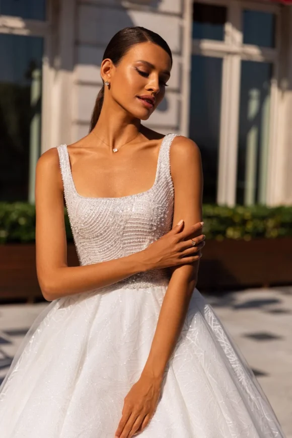 Sparkling A-line dress with gorgeous pattern and soft flower skirt